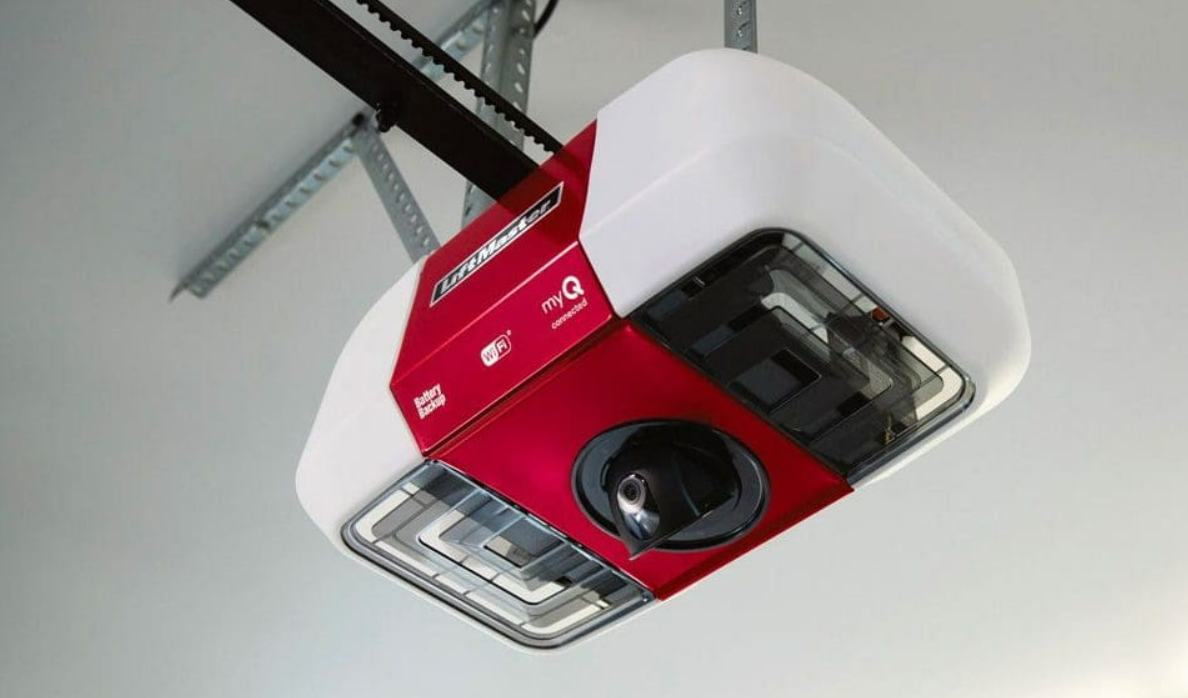 Technician installing a modern garage door opener in a residential garage in Dublin, showcasing professional garage door repair services."