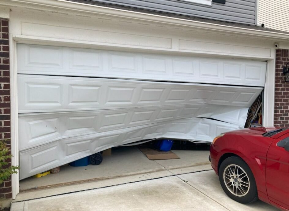 "Technician performing garage door repair services in Delaware, Ohio